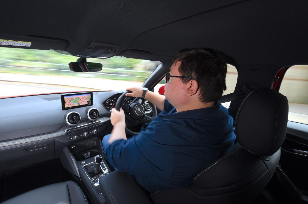 Darren Moss test driving Audi Q2