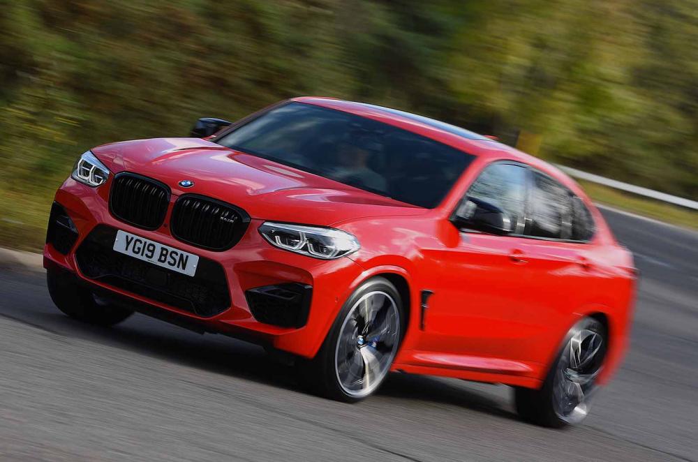 BMW X4 M Competition 2019 RHD front left cornering 