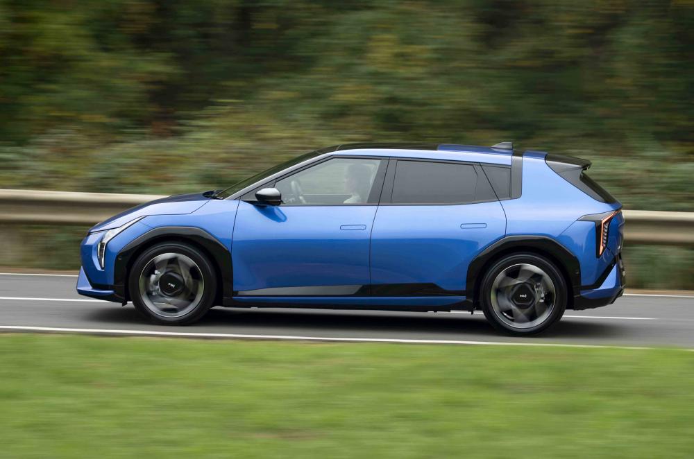 Kia EV4 hatchback side profile dynamic