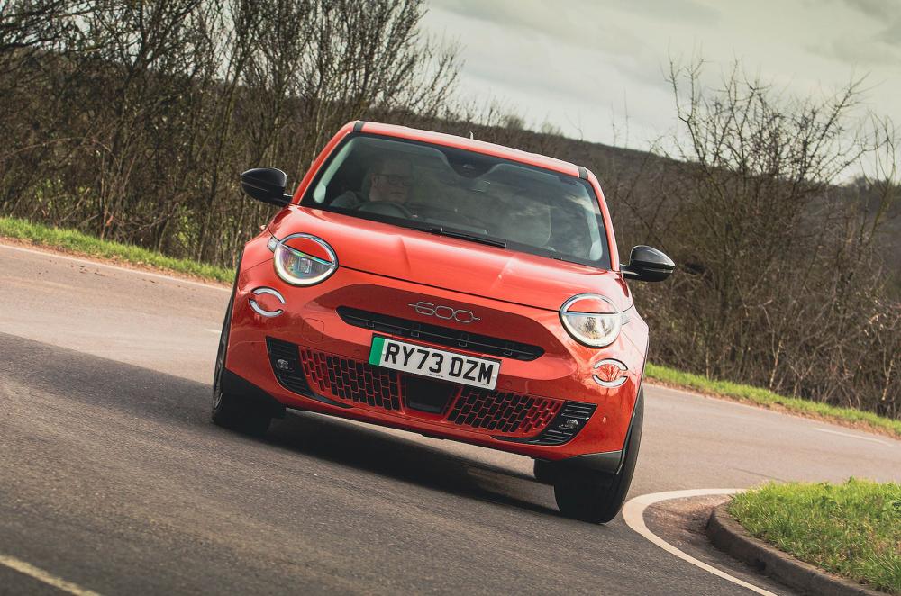 Orange Fiat 600e front cornering