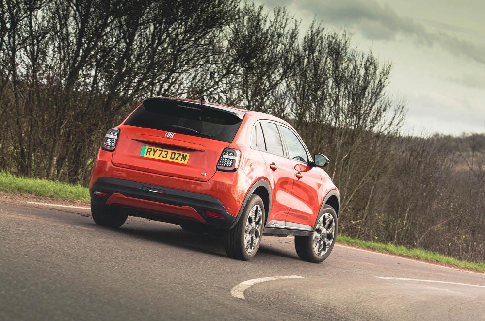 Orange Fiat 600e rear cornering