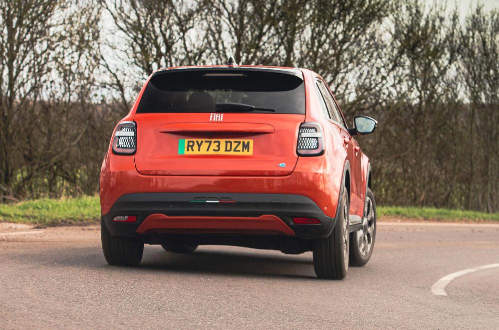 Orange Fiat 600e rear cornering