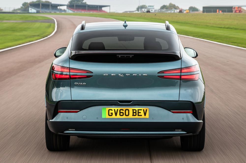 Genesis GV60 driving rear