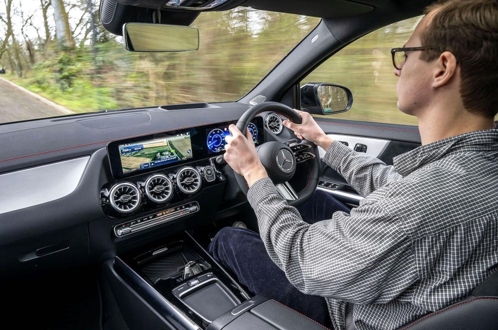 George Hill test driving Mercedes EQA