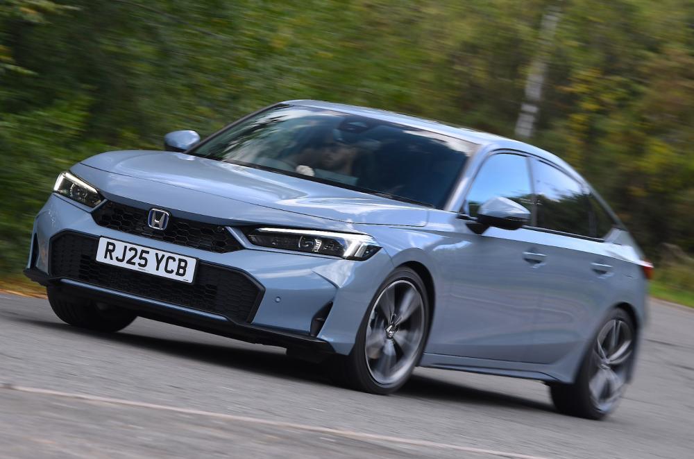 Honda Civic e:HEV driving front quarter