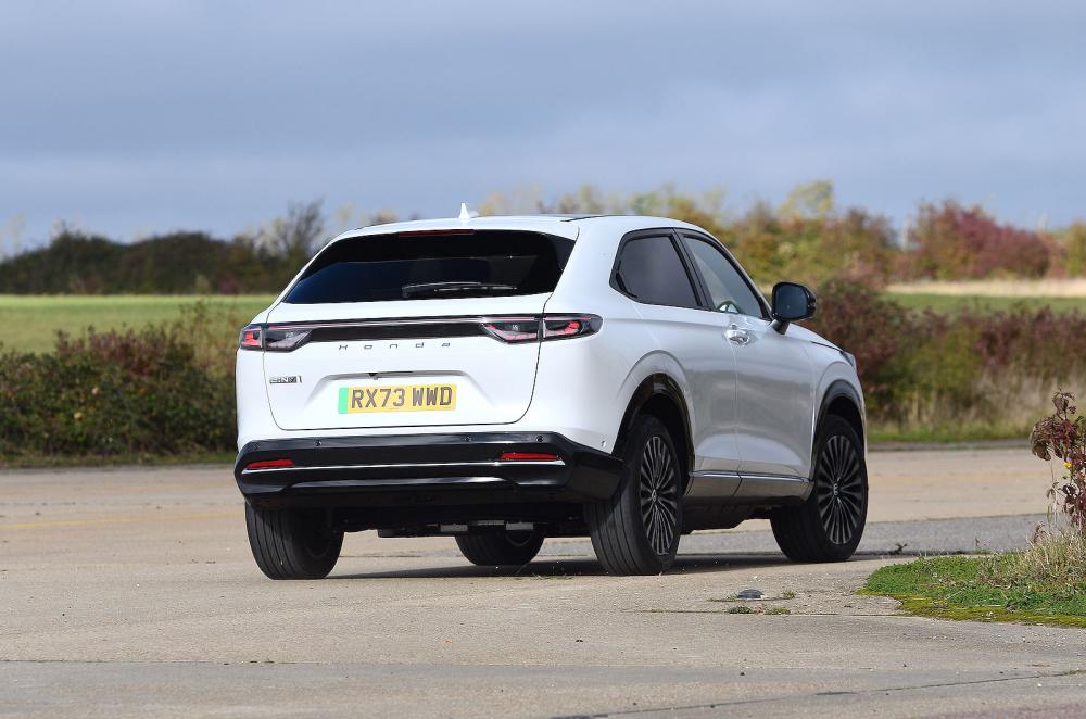 White Honda e:Ny1 rear cornering