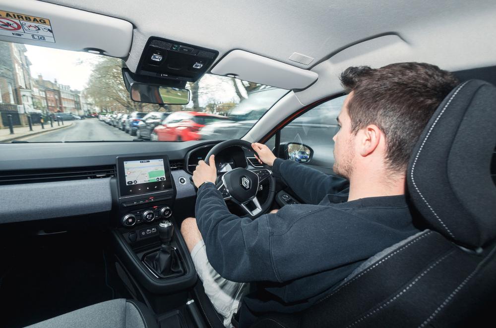 Jonty Renk test driving Renault Clio