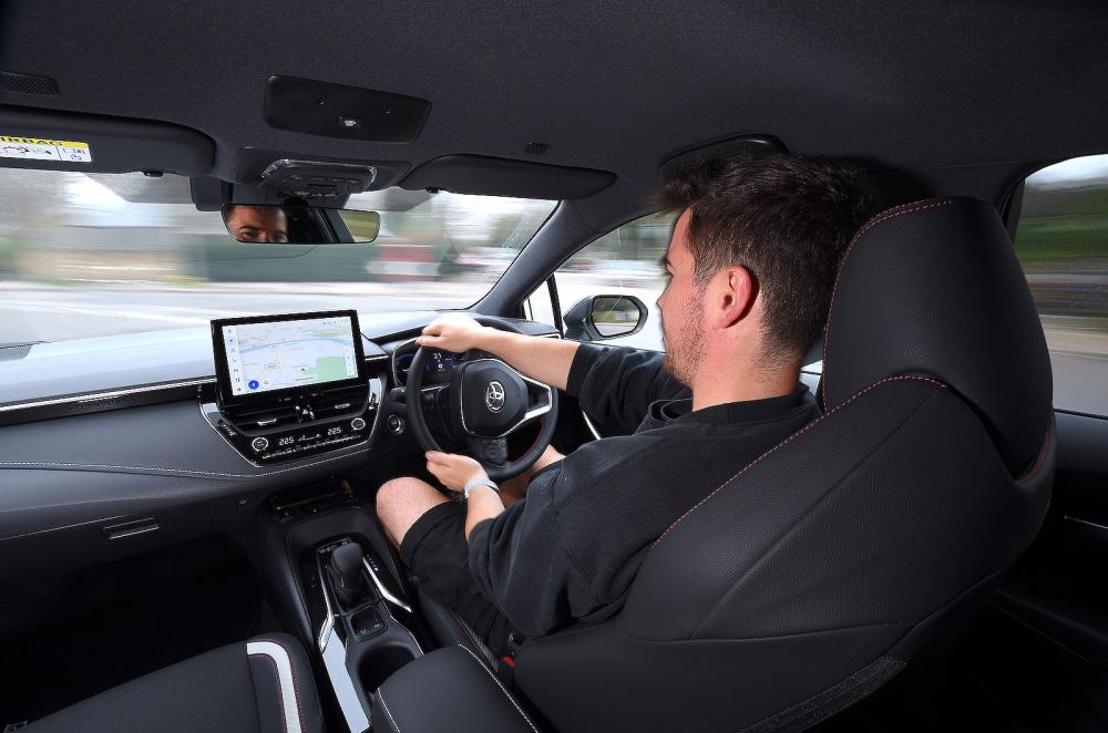 Jonty Renk test driving Toyota Corolla Touring Sports