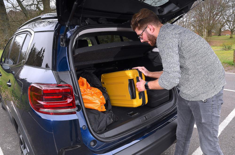 Kiall Garrett loading Citroen C5 Aircross boot