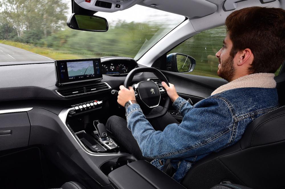 Kiall Garrett test driving Peugeot 5008