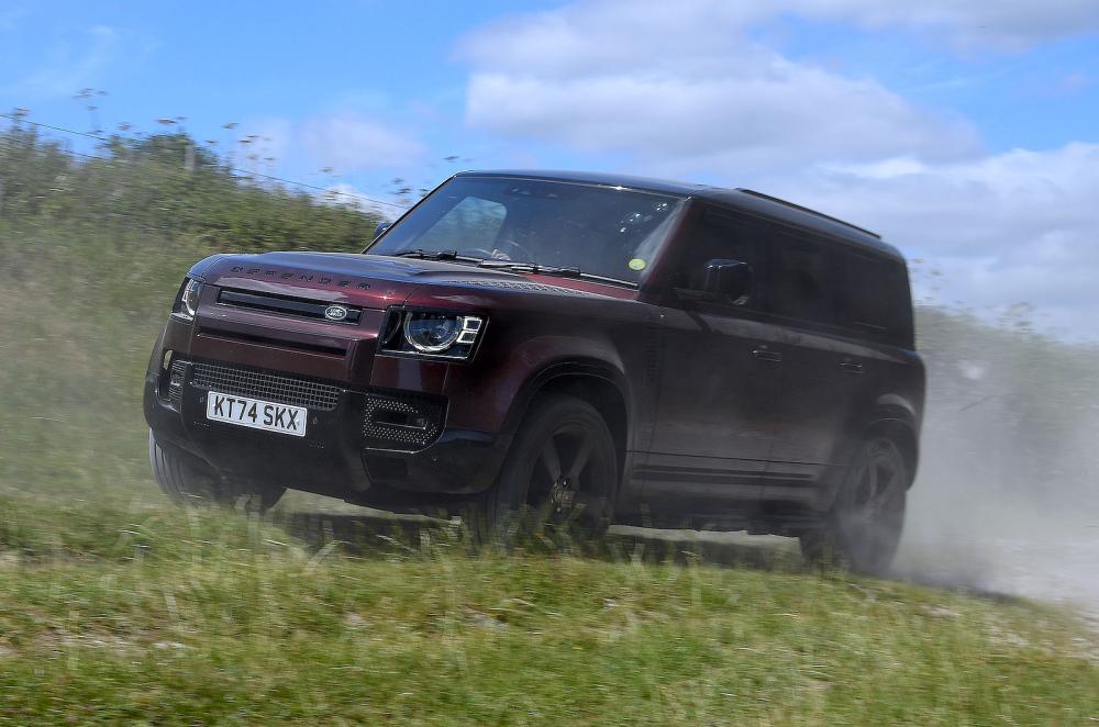Land Rover Defender 110 left driving off road