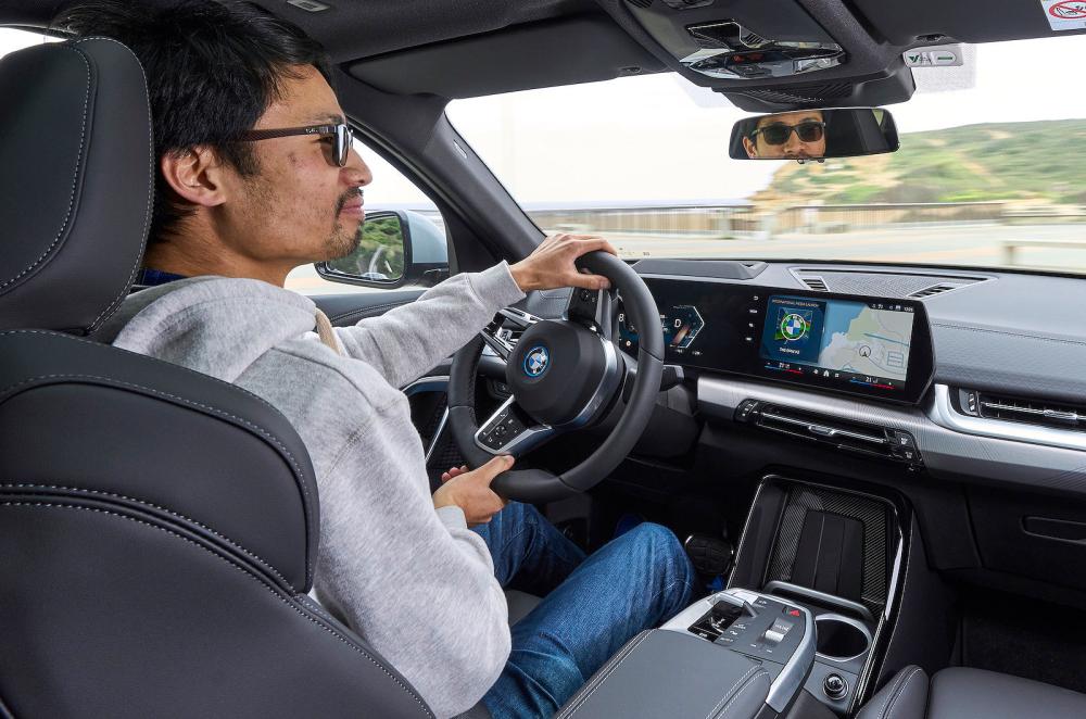 Lawrence Cheung test driving BMW iX2