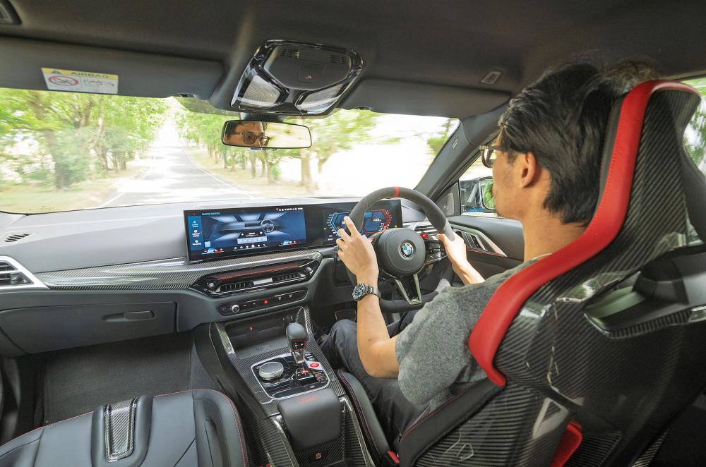 Lawrence Cheung test driving BMW M4 CS