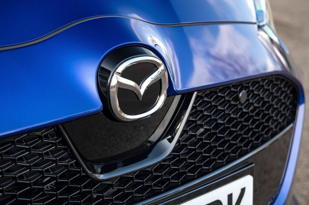 Blue Mazda 2 Hybrid front badge