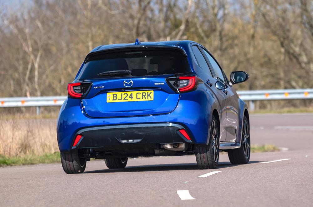 Blue Mazda 2 Hybrid rear cornering