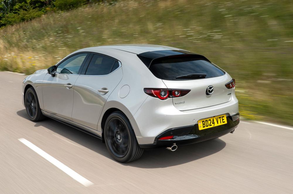 Mazda 3 rear left driving