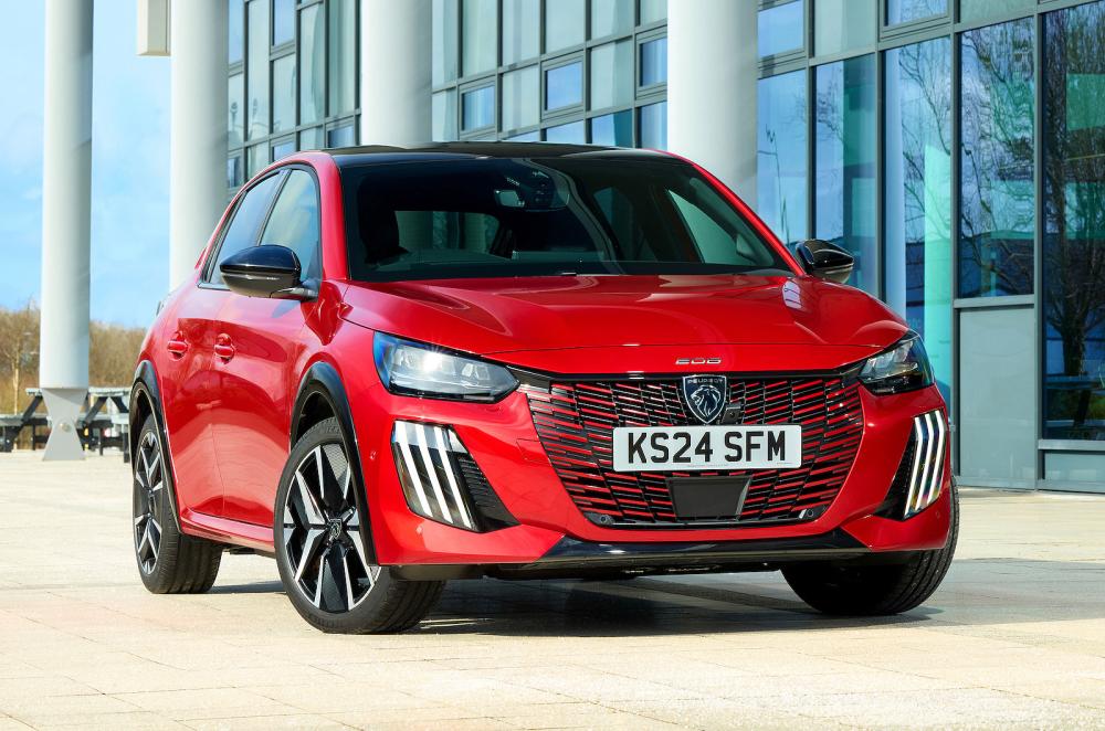 Red Peugeot 208 front right static