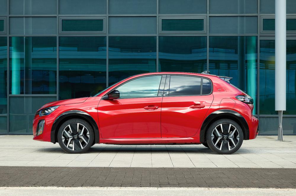 Red Peugeot 208 left static