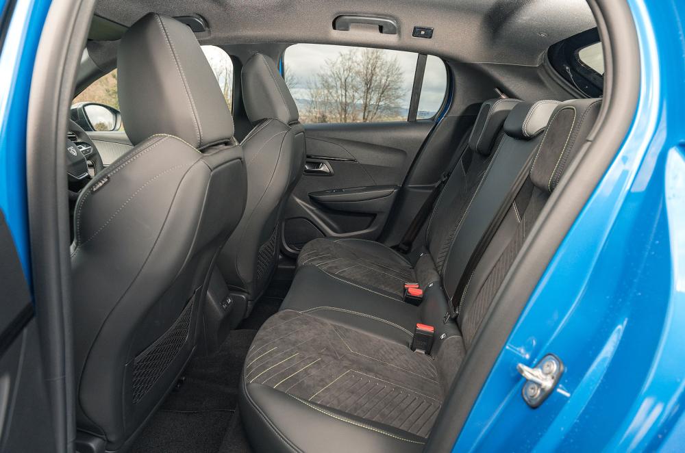 Blue Peugeot e-208 interior back seats