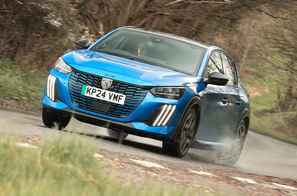 Blue Peugeot e-208 front cornering