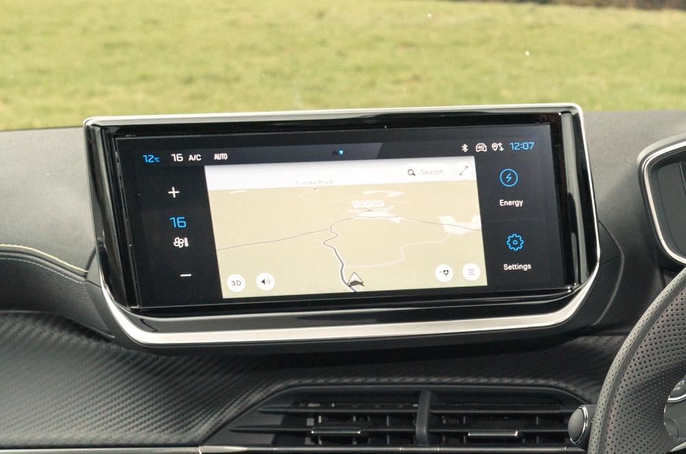 Blue Peugeot e-208 interior infotainment