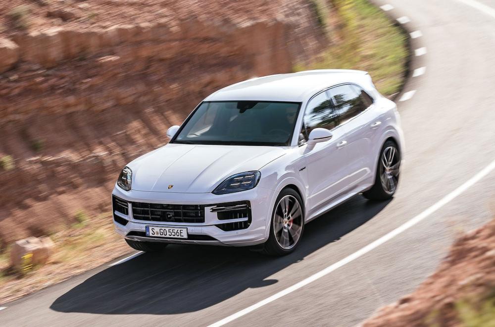 White Porsche Cayenne front cornering