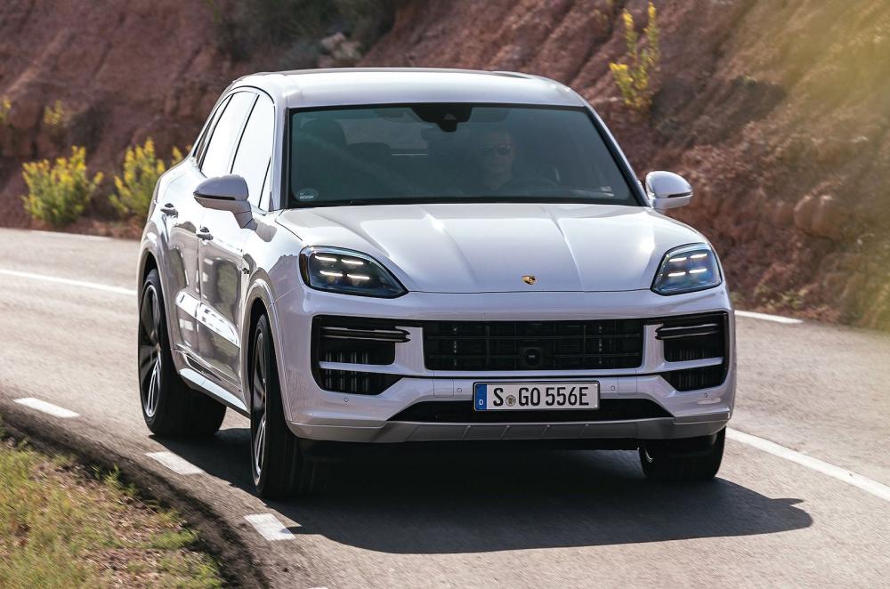 White Porsche Cayenne front cornering