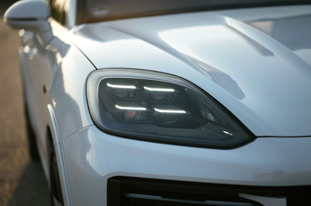White Porsche Cayenne headlights detail