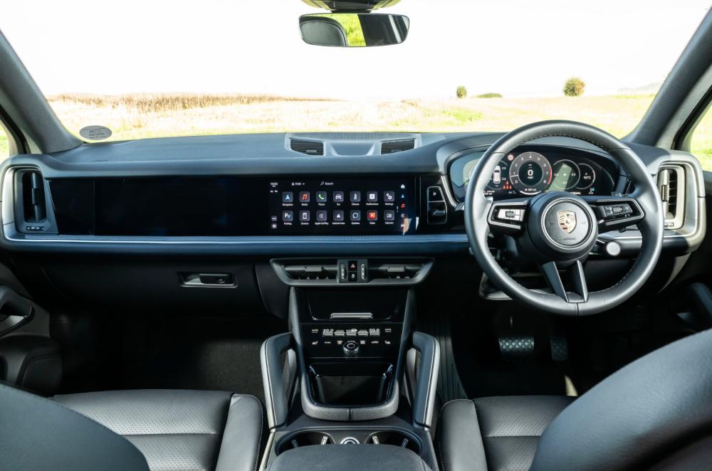 Silver Porsche Cayenne dashboard view