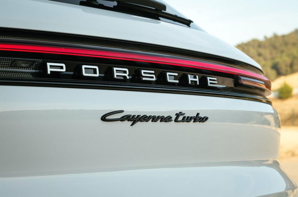 White Porsche Cayenne rear badge detail