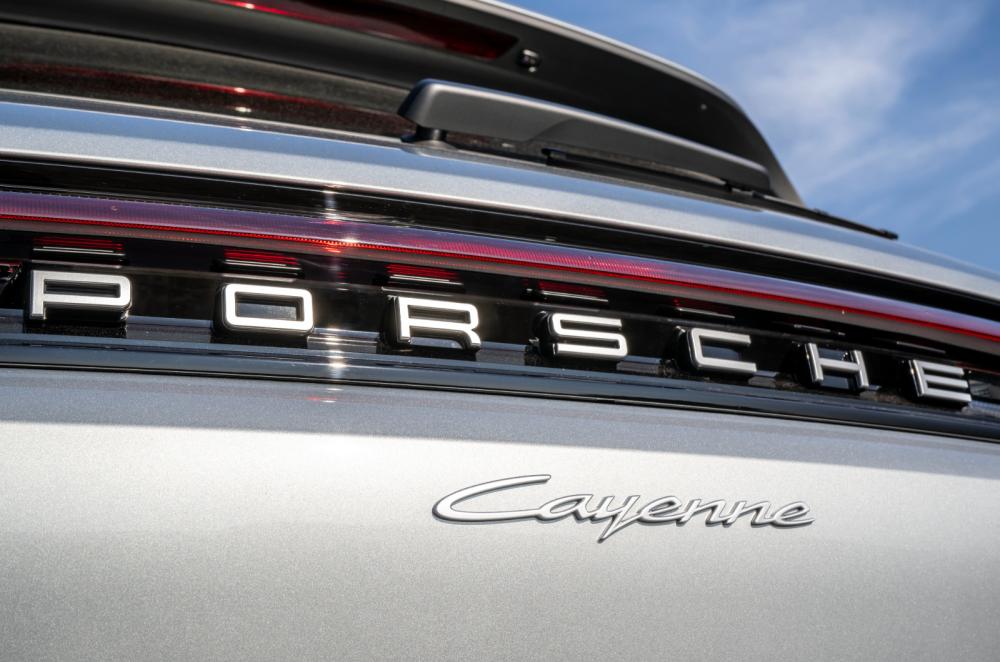 White Porsche Cayenne rear badge detail
