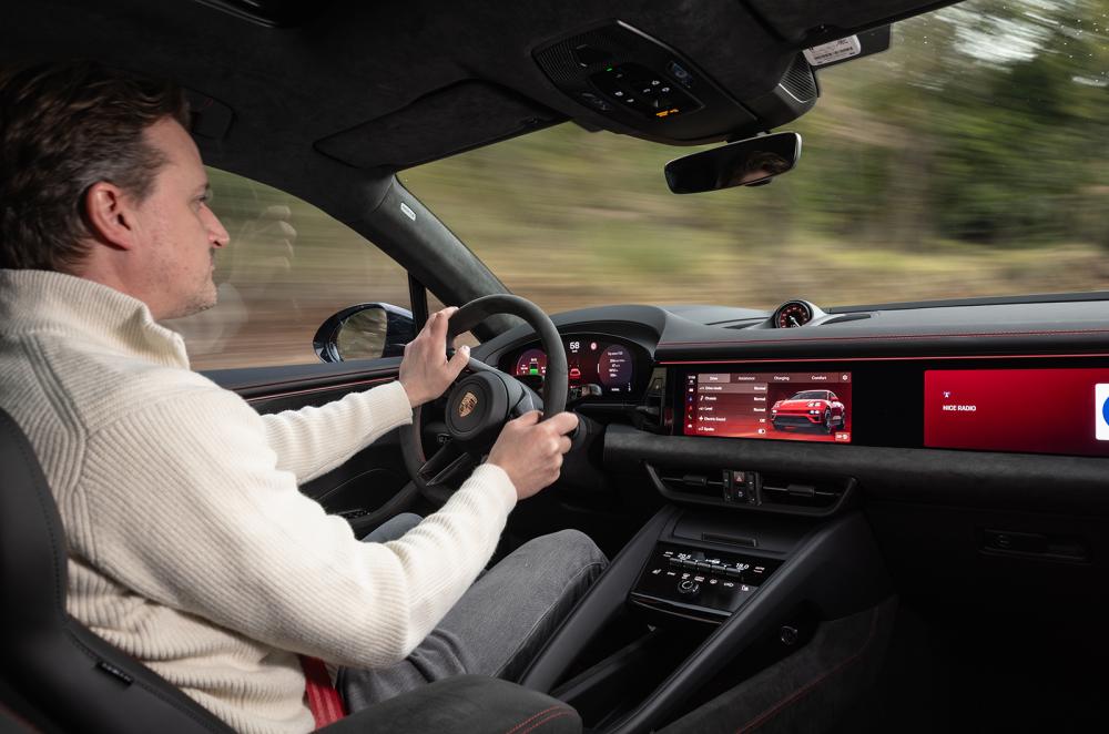 john Howell driving the Porsche Macan Electric GTS