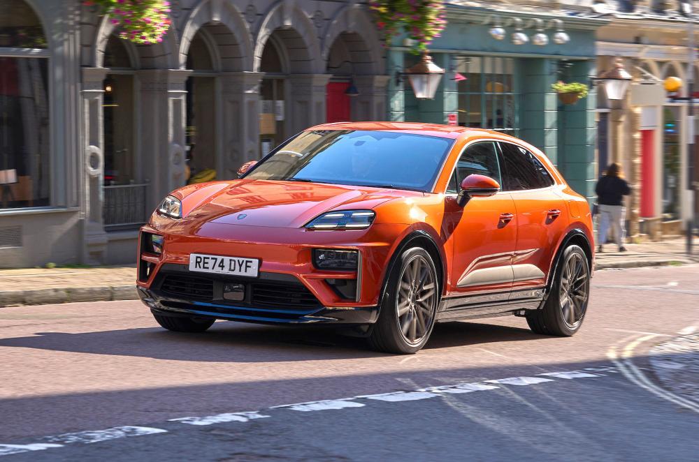 Porsche Macan Turbo Electric front left driving