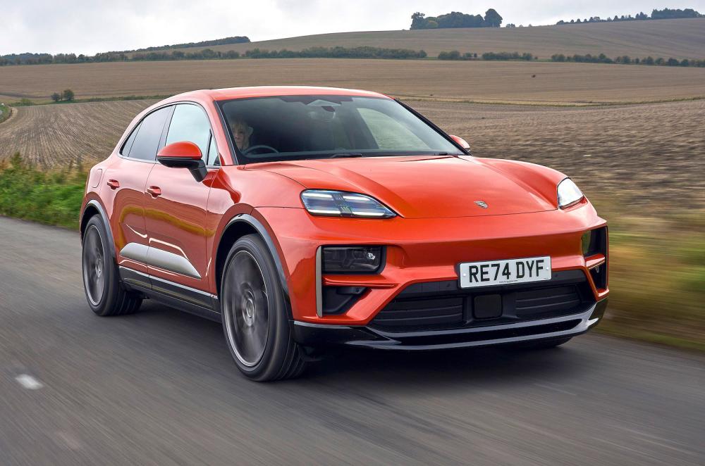 Porsche Macan Turbo Electric front right driving