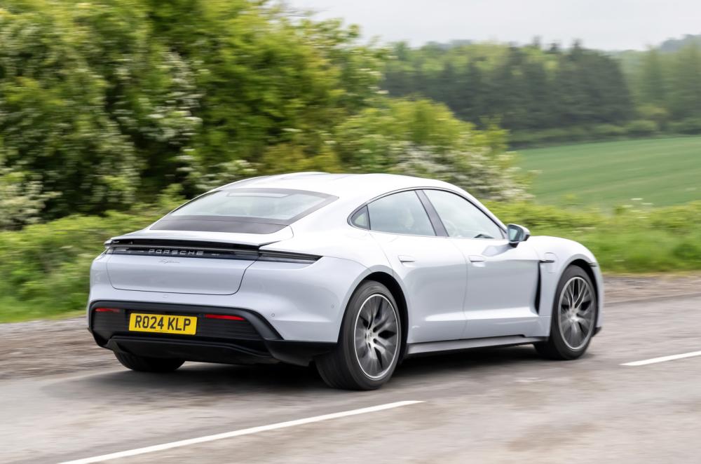 Porsche Taycan rear driving silver
