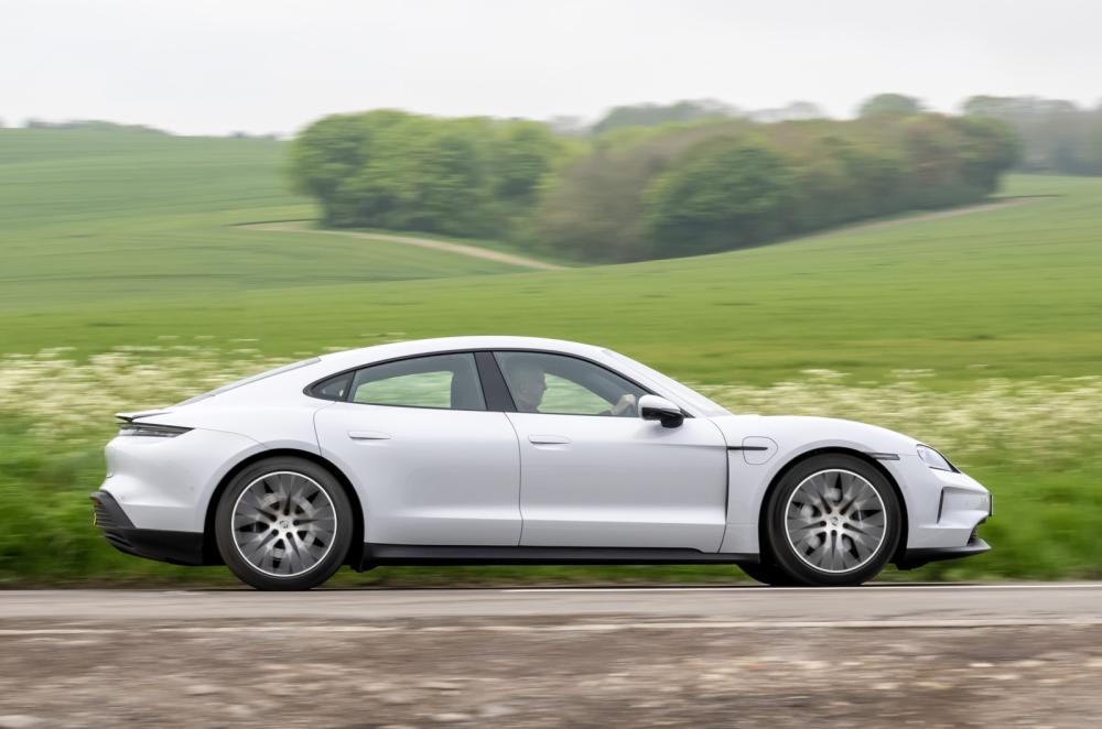 Porsche Taycan side driving silver