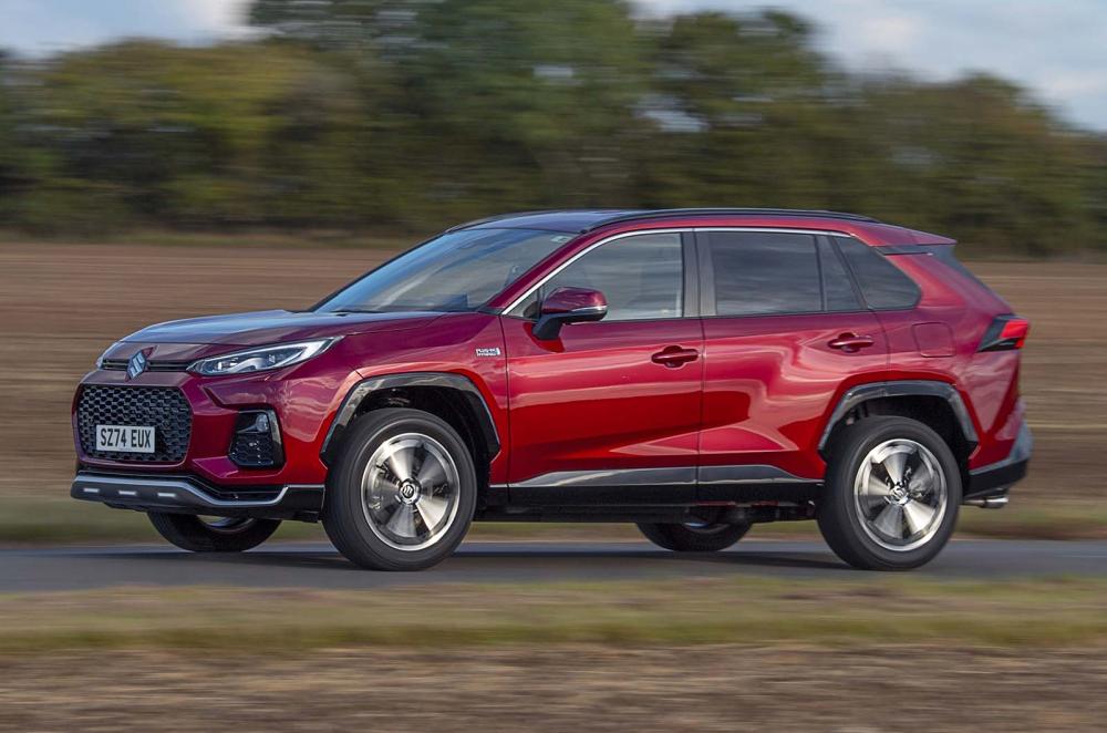 Suzuki Across side right driving red