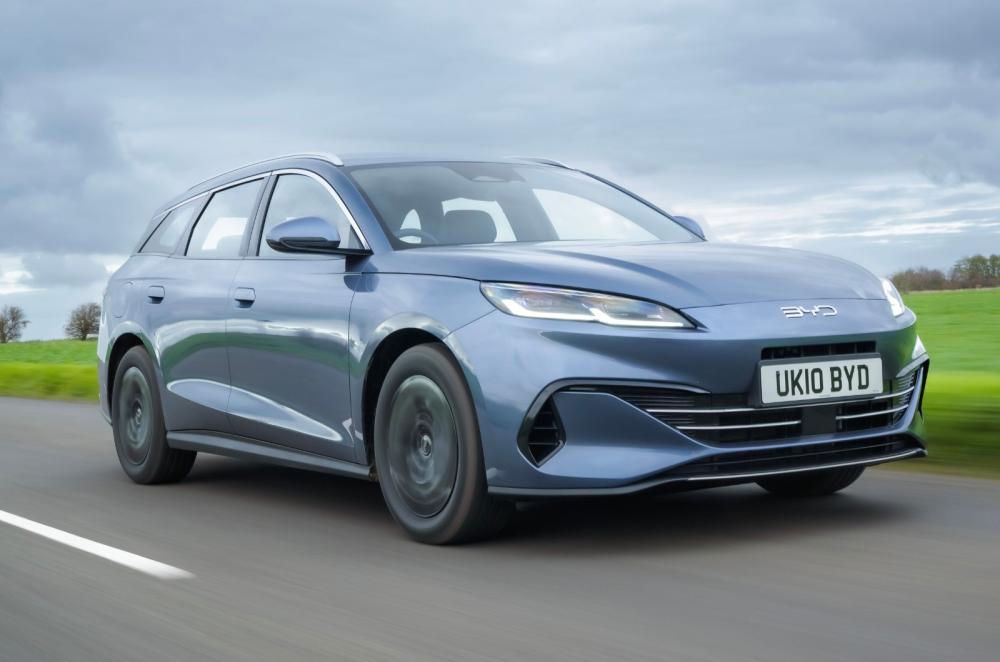 Blue BYD Seal 6 Touring tracking right