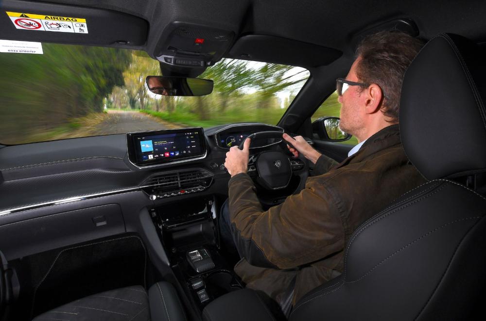 Peugeot e-208 interior driving shot