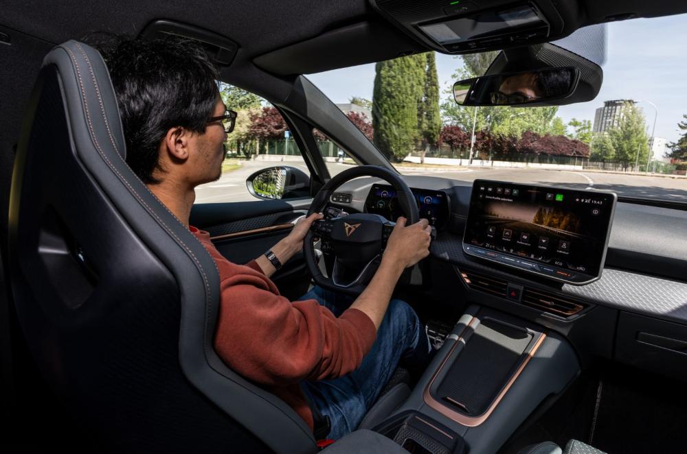 Cupra Born interior driving shot Lawrence Cheung