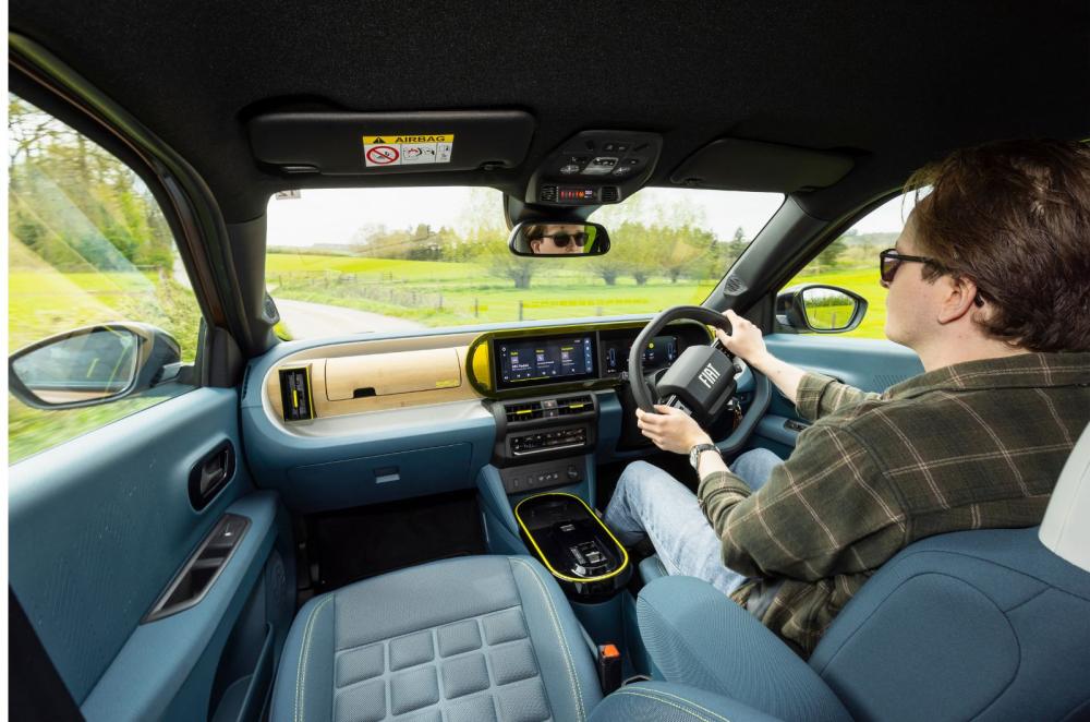Fiat Grande Panda Hybrid Oliver Young interior driving