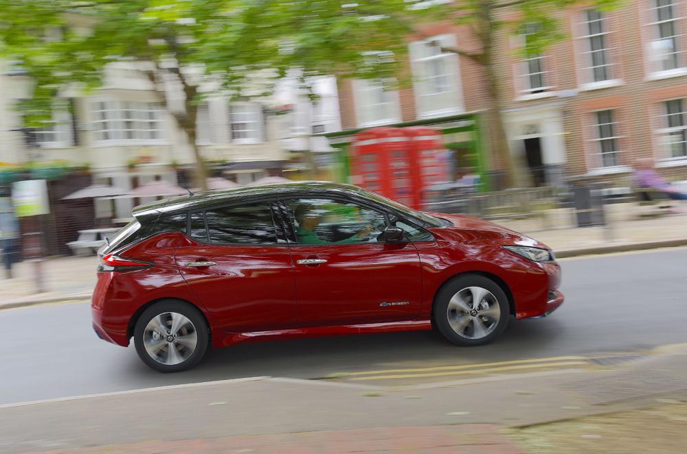 Used Nissan Leaf 2018-2024 side driving red