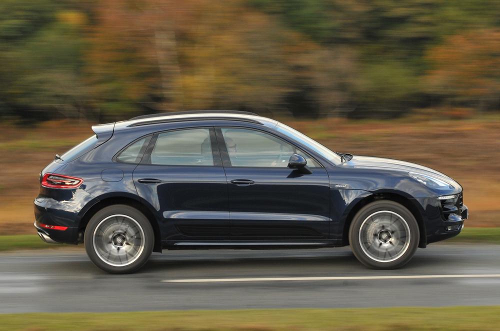 Used Porsche Macan 2014-present panning shot blue