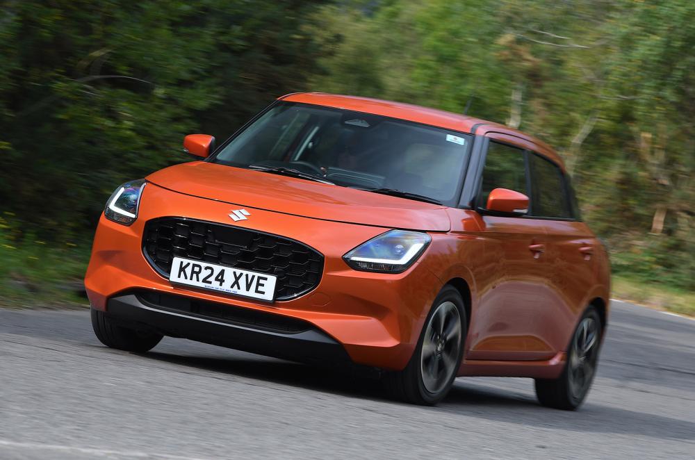 Used Suzuki Swift 2024-present front cornering orange