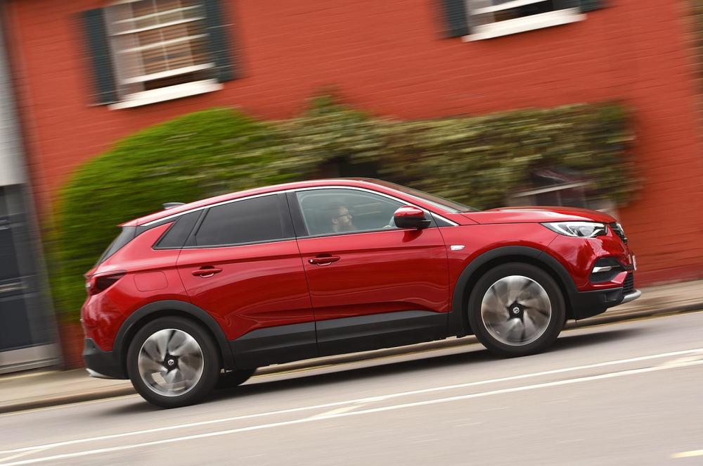 Used Vauxhall Grandland 2018-2024 side driving red