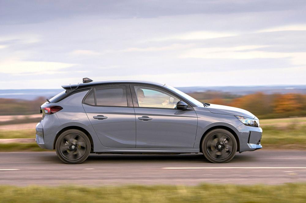 Grey Vauxhall Corsa Electric right driving