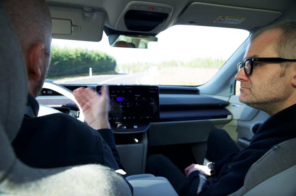 Volvo EX60 over-the-shoulder driving