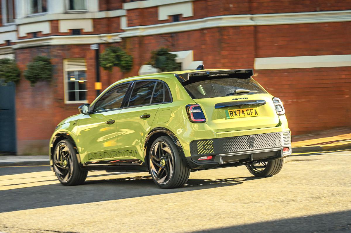 Abarth 600e rear left driving