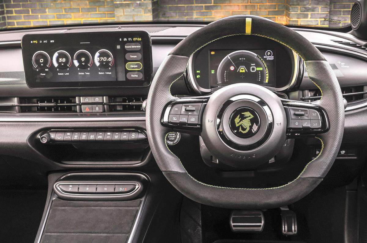 Abarth 600e steering wheel and screens