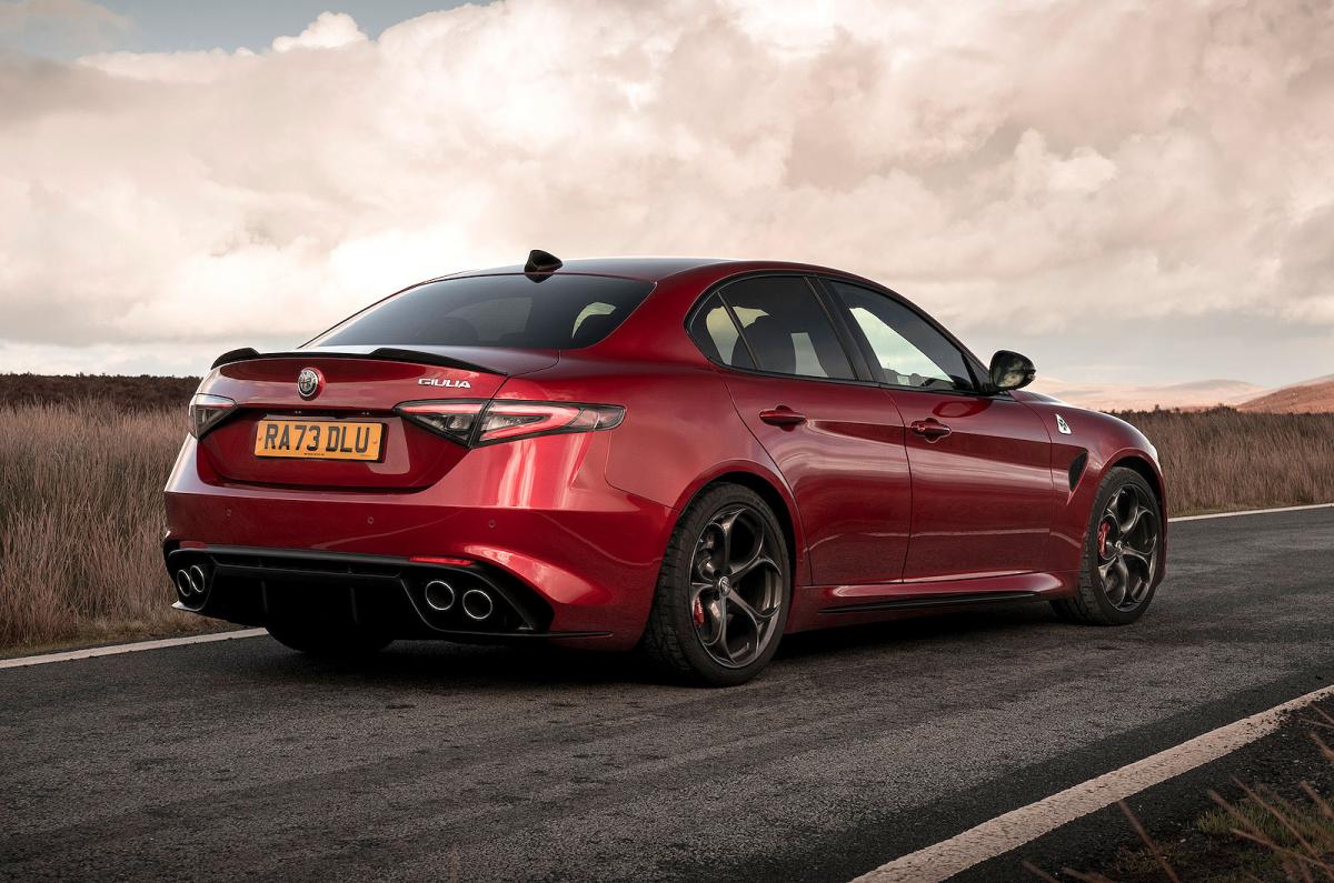 Red Alfa Romeo Giulia Quadrifoglio rear right static